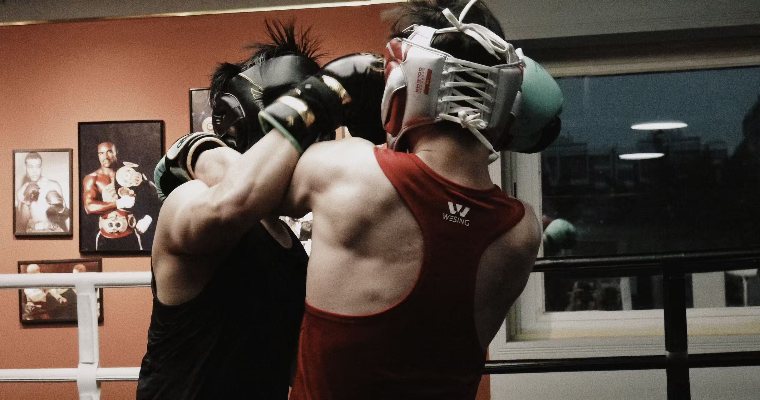 Close-up of a sparring session in the boxing ring, in full color